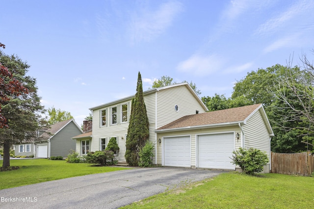 2 Faucett Ln, Pittsfield, MA 01201 - colonial home with an attached garage, asphalt driveway, and a shingled roof