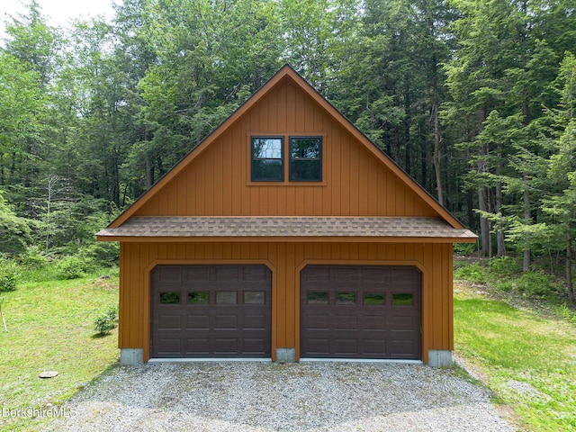 309 Tamarack Trl, Sandisfield, MA 01255 - garage with a view of trees and a garage