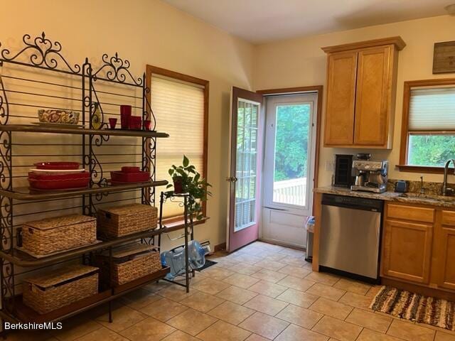 8 Stanley Dr Unit A-4, Great Barrington, MA 01230 - kitchen featuring dishwasher, a sink, brown cabinets, and dark stone countertops