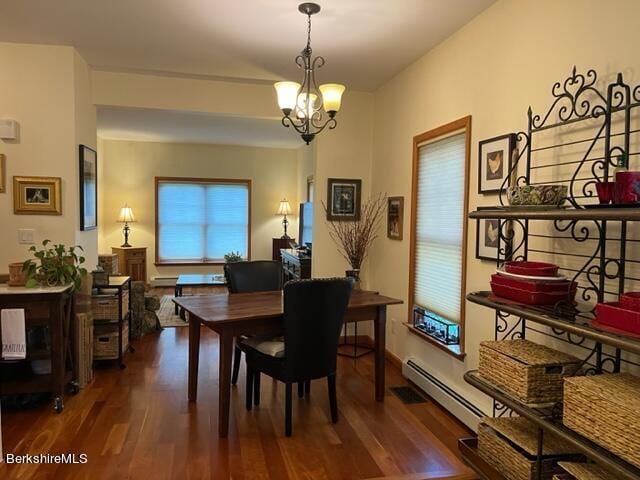 8 Stanley Dr Unit A-4, Great Barrington, MA 01230 - dining space with wood finished floors, baseboard heating, and a chandelier