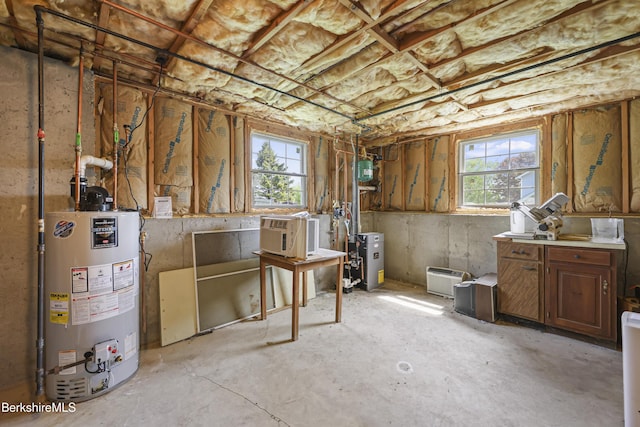 120 Via Maria St, Lee, MA 01238 - below grade area featuring water heater and healthy amount of natural light