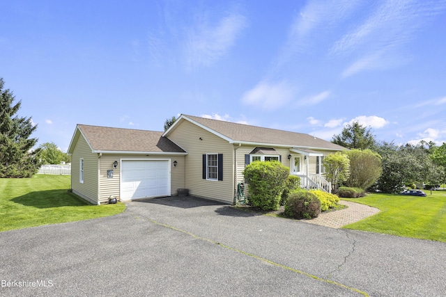 120 Via Maria St, Lee, MA 01238 - single story home featuring an attached garage, driveway, a front lawn, and roof with shingles