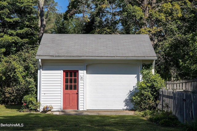 garage with a lawn