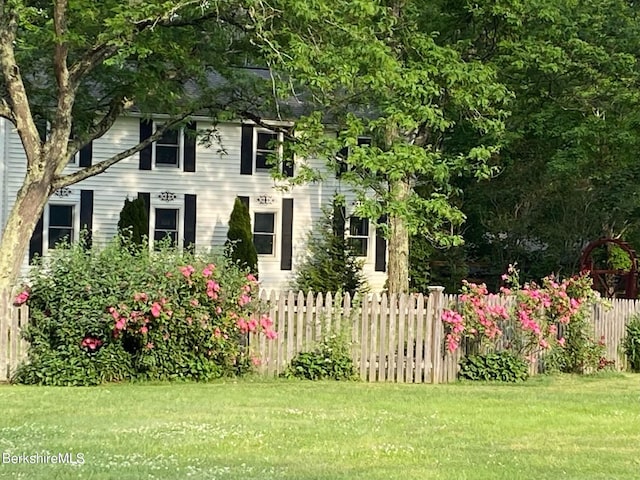 colonial house with a front yard