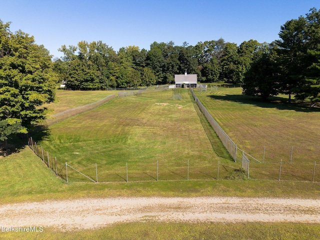 view of yard with a rural view