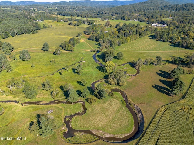 birds eye view of property with a rural view