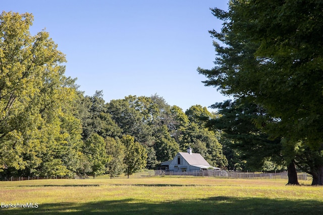 view of yard with a rural view