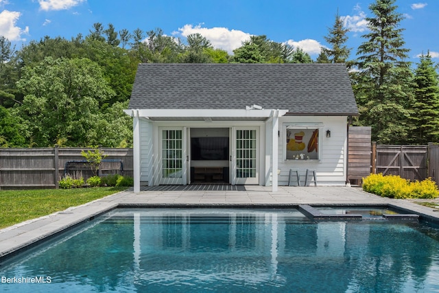 1030 W St, Pittsfield, MA 01201 - view of swimming pool featuring a storage structure, an outbuilding, a fenced backyard, and a pool with connected hot tub