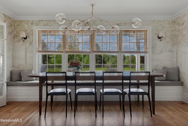1030 W St, Pittsfield, MA 01201 - dining room featuring wallpapered walls, wood finished floors, ornamental molding, and breakfast area