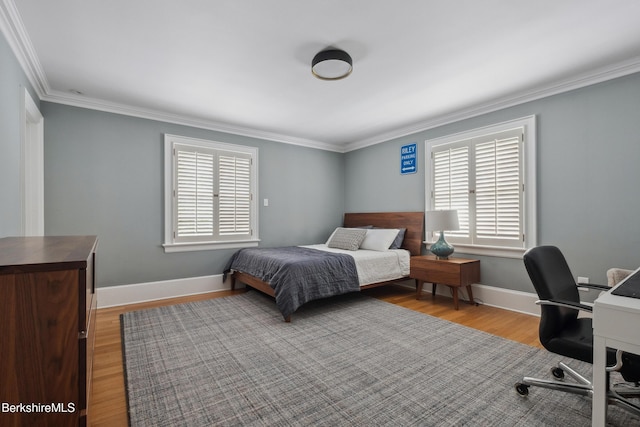 1030 W St, Pittsfield, MA 01201 - bedroom with crown molding, wood finished floors, and a desk