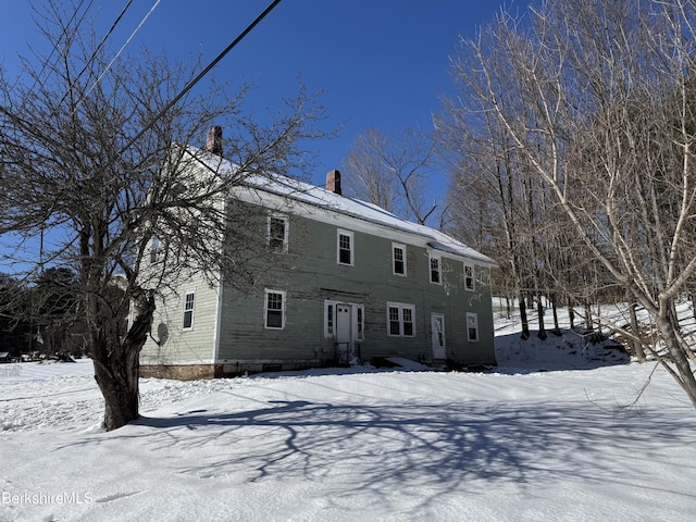 colonial home with a chimney