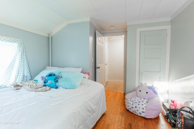 bedroom with light wood-style floors