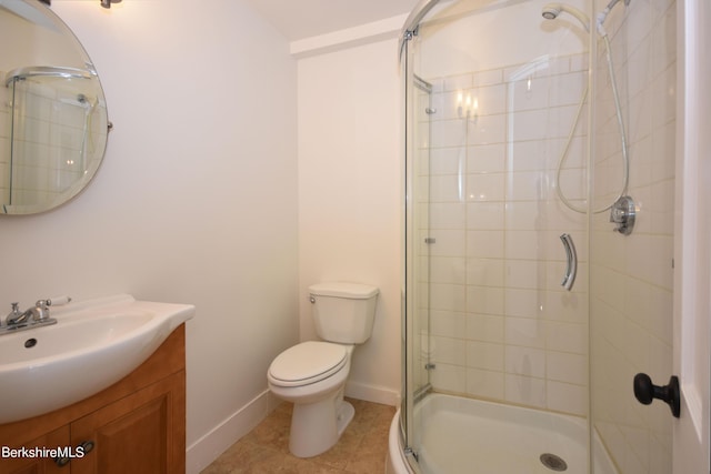 bathroom with toilet, an enclosed shower, vanity, and tile patterned floors