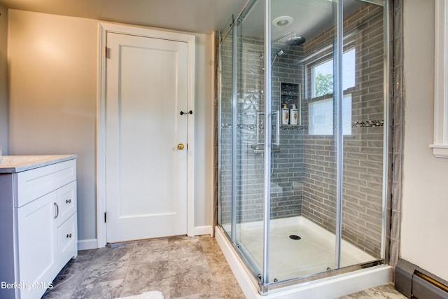 bathroom featuring an enclosed shower