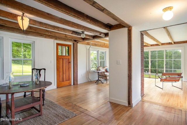 649 Hewins St, Sheffield, MA 01257 - entrance foyer featuring beamed ceiling, light wood finished floors, and baseboards