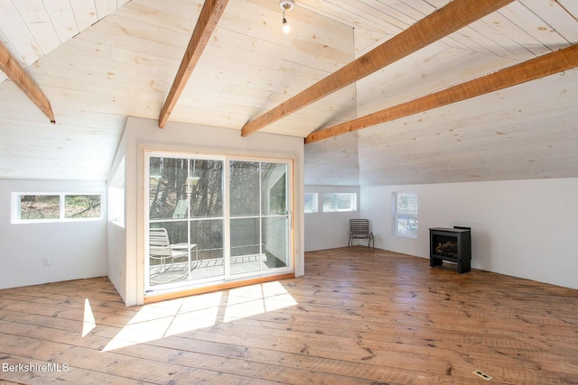 649 Hewins St, Sheffield, MA 01257 - additional living space with a wood stove, wood-type flooring, and wood ceiling