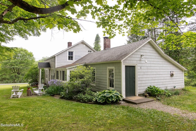649 Hewins St, Sheffield, MA 01257 - back of house with a chimney, a lawn, and roof with shingles