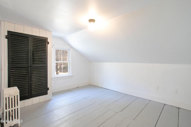 649 Hewins St, Sheffield, MA 01257 - additional living space featuring vaulted ceiling, baseboards, and wood finished floors
