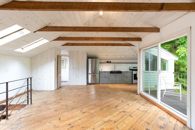649 Hewins St, Sheffield, MA 01257 - unfurnished living room featuring a skylight, a sink, light wood-style flooring, and wood ceiling