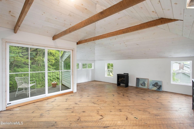 649 Hewins St, Sheffield, MA 01257 - unfurnished living room featuring a wood stove, plenty of natural light, hardwood / wood-style flooring, and wooden ceiling