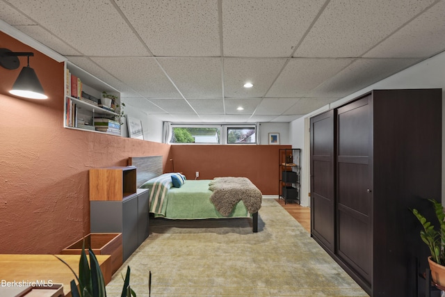 72 Cleveland St, Pittsfield, MA 01201 - bedroom with a paneled ceiling, recessed lighting, wood finished floors, and a textured wall