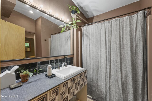 72 Cleveland St, Pittsfield, MA 01201 - bathroom with tasteful backsplash, vanity, tile patterned floors, and curtained shower