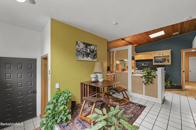 72 Cleveland St, Pittsfield, MA 01201 - dining space featuring light tile patterned floors and lofted ceiling