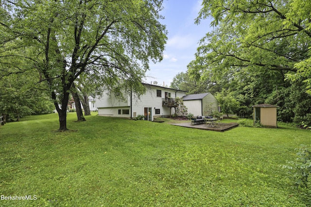 72 Cleveland St, Pittsfield, MA 01201 - view of grassy yard featuring a shed and a deck
