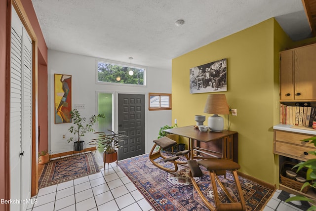 72 Cleveland St, Pittsfield, MA 01201 - home office featuring light tile patterned floors and a textured ceiling