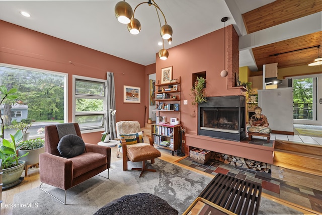 72 Cleveland St, Pittsfield, MA 01201 - living room with a fireplace with raised hearth, wood finished floors, and recessed lighting