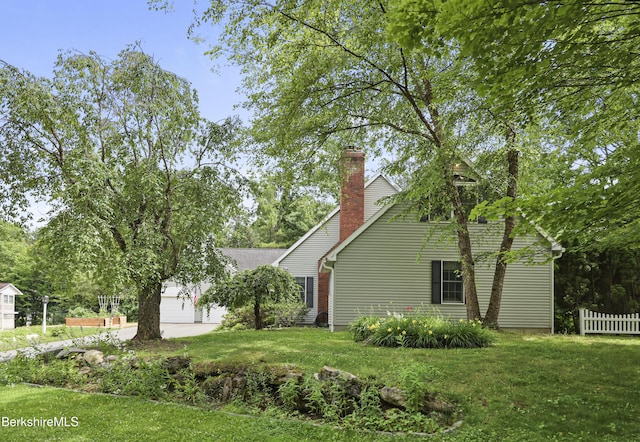 67 Dunmore Ct, Lenox, MA 01240 - view of yard with a garage