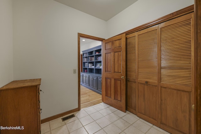 67 Dunmore Ct, Lenox, MA 01240 - corridor with light tile patterned flooring and baseboards