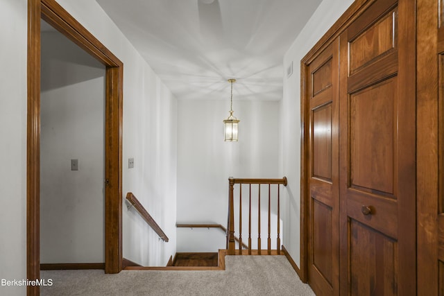 67 Dunmore Ct, Lenox, MA 01240 - hallway featuring an upstairs landing and carpet