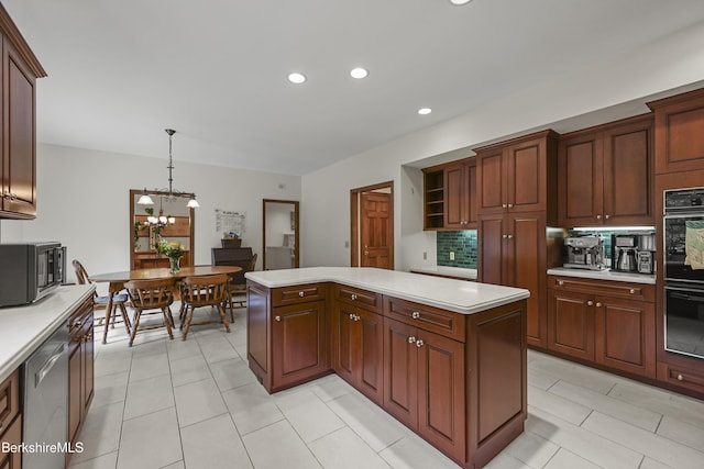 67 Dunmore Ct, Lenox, MA 01240 - kitchen featuring a center island, stainless steel dishwasher, light countertops, recessed lighting, and decorative backsplash