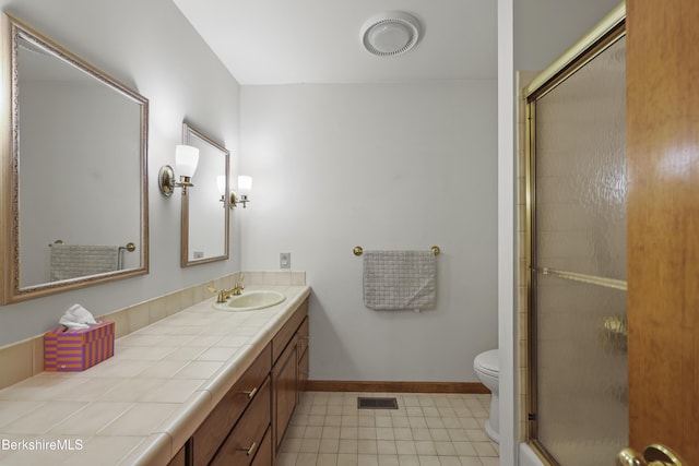 67 Dunmore Ct, Lenox, MA 01240 - bathroom with vanity, a shower with shower door, and tile patterned flooring