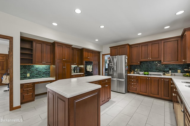 67 Dunmore Ct, Lenox, MA 01240 - kitchen featuring stainless steel refrigerator with ice dispenser, decorative backsplash, a kitchen island, light countertops, and open shelves
