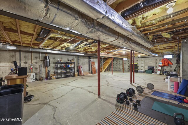 67 Dunmore Ct, Lenox, MA 01240 - unfinished below grade area featuring a central vacuum unit and stairway
