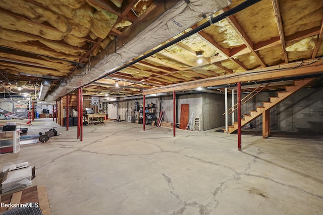 67 Dunmore Ct, Lenox, MA 01240 - unfinished below grade area featuring stairs