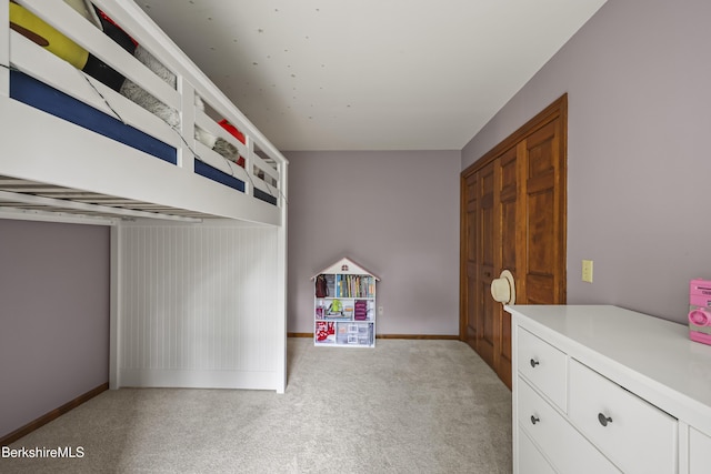 67 Dunmore Ct, Lenox, MA 01240 - unfurnished bedroom featuring light colored carpet and baseboards