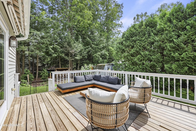 67 Dunmore Ct, Lenox, MA 01240 - wooden terrace with a storage unit and an outdoor living space