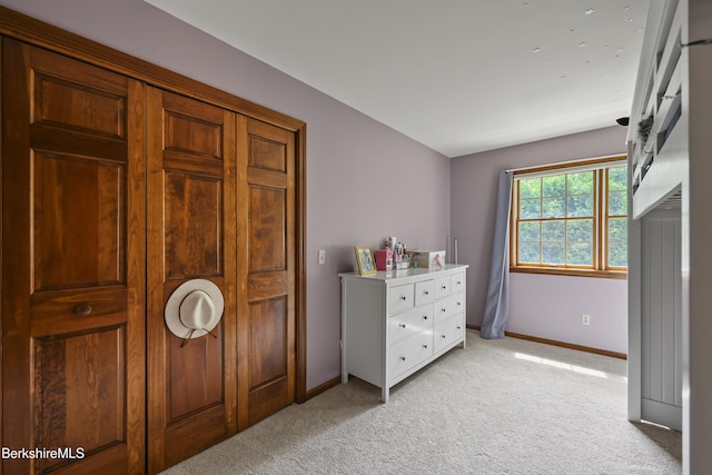 67 Dunmore Ct, Lenox, MA 01240 - bedroom with light carpet and baseboards