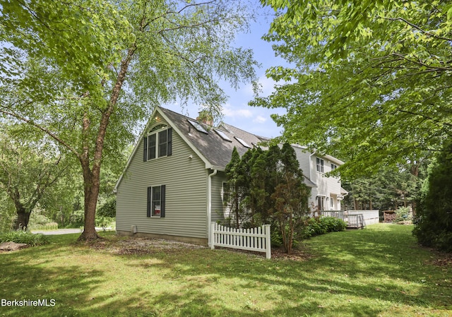 67 Dunmore Ct, Lenox, MA 01240 - view of side of home with a lawn and a shingled roof