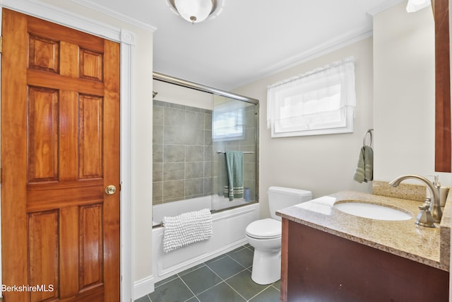 full bathroom featuring vanity, crown molding, toilet, tile patterned floors, and combined bath / shower with glass door