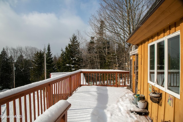 view of snow covered deck