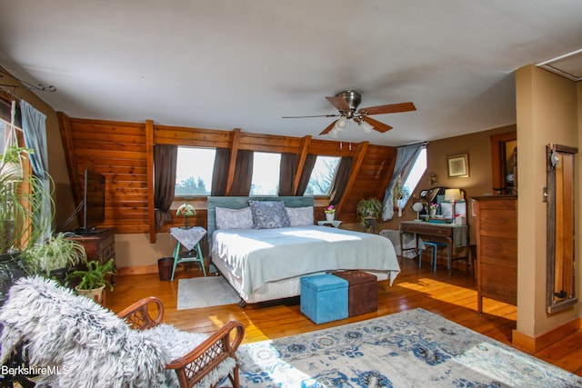 bedroom featuring ceiling fan and light hardwood / wood-style floors