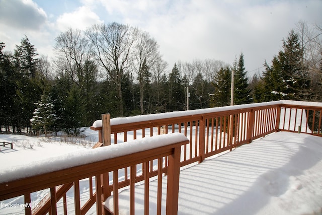 view of snow covered deck