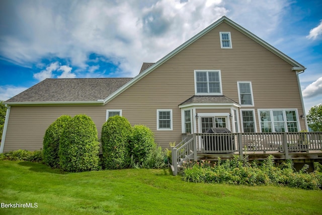 11 Blossom Hl Unit 11, Lenox, MA 01240 - rear view of property featuring a wooden deck, a yard, and roof with shingles