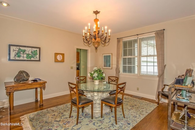 11 Blossom Hl Unit 11, Lenox, MA 01240 - dining space with a chandelier, wood finished floors, and crown molding