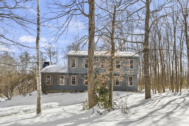 view of front of property featuring a chimney