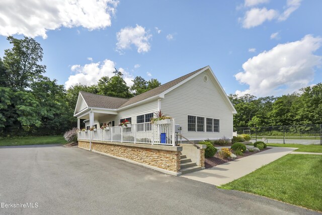 5 Aspen Way Lot 17, Pittsfield, MA 01201 - view of front of house featuring aphalt driveway, fence, and a porch